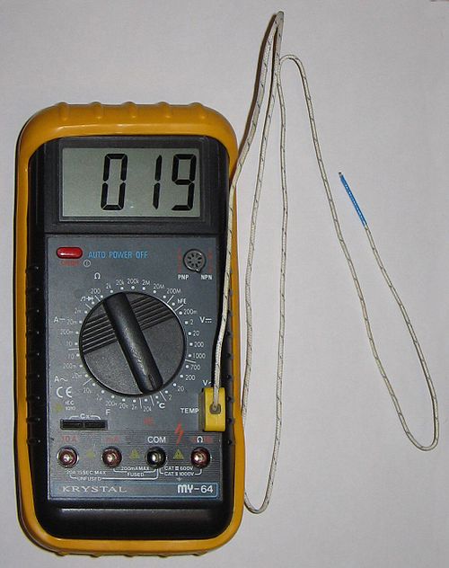K-type thermocouple connected to a digital meter